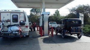 Just your average fill-up next to a Model T.... !!!!